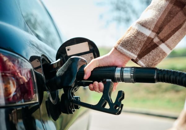 side-view-of-the-hand-of-woman-filling-her-car-wit-2023-11-27-05-12-17-utc.jpg